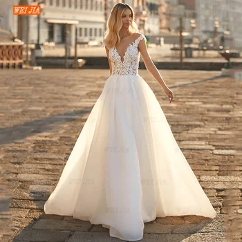 Vintage Dantel Aplikler düğün elbisesi A-Line Illusion V Boyun Cap Sleeve Düğme Geri Tül Gelin gelin kıyafeti Vestidos De Novia